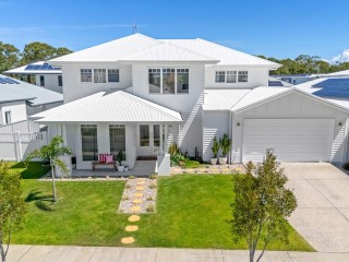 GRAND DESIGN LIVING WITH SOARING VOIDS & RESORT STYLE ENTERTAINING